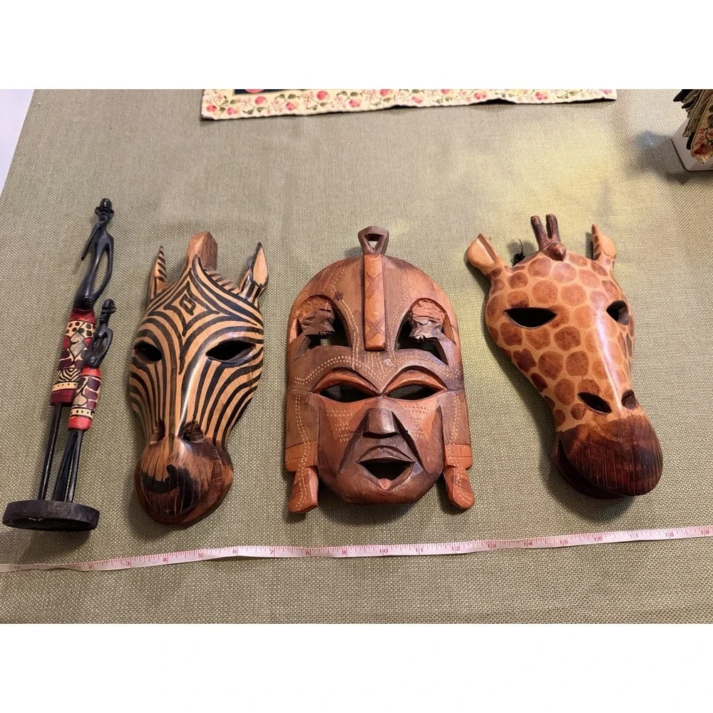 hand carved wooden African Masks Plus Statue Lot Of 4 Pieces Animal And Head
